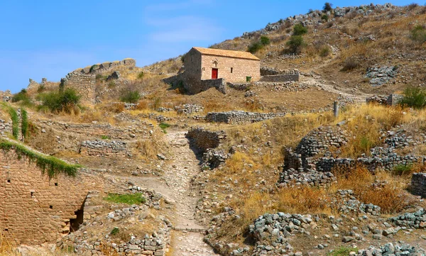 Hus på Acrocorinth bakken - Stock-foto