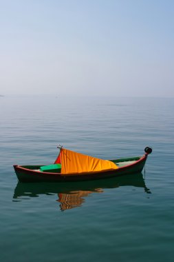 Lonely boat in Aegean Sea clipart