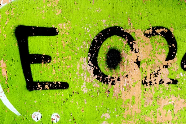 Verde grunge fundo com letras pretas — Fotografia de Stock
