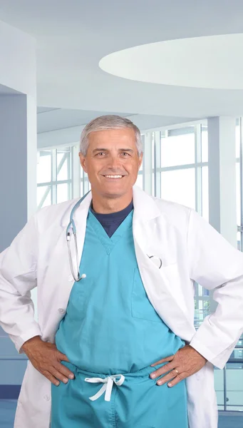 Middle aged doctor in modern office — Stock Photo, Image