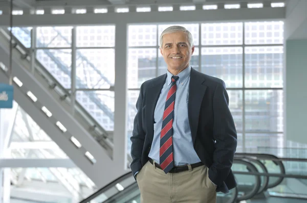 Smiling Middle Aged Businessman Standing Lobby Modern Office Building Man — Stock Photo, Image