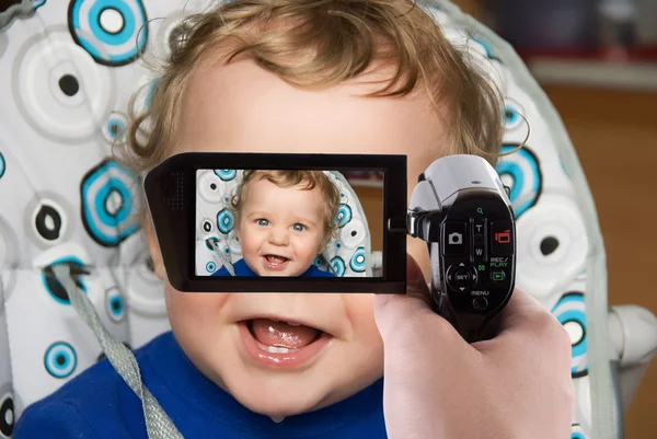 Baby boy to camcorder — Stock Photo, Image