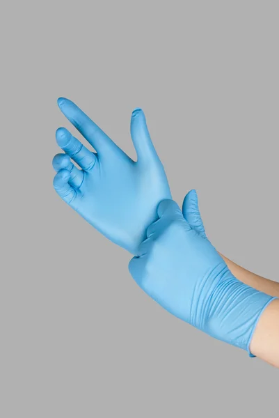 Синие перчатки — стоковое фото