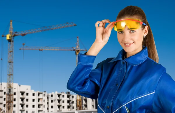 Builder Pretty Girl Safety Glasses Building Background — Stock Photo, Image