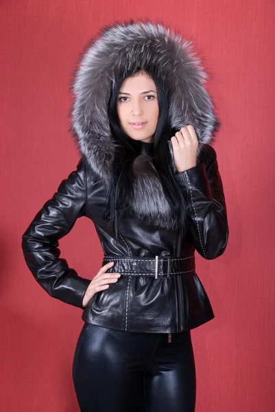 Beautiful Woman Fur Coat Red Background — Stock Photo, Image