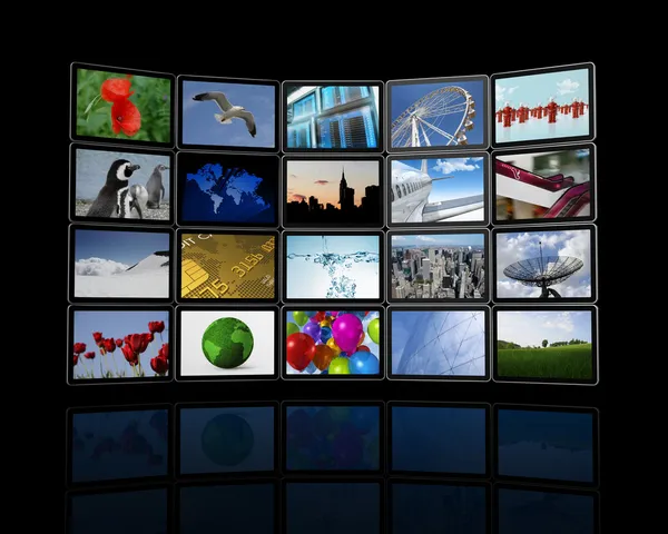 Pared de vídeo hecha de pantallas de televisión planas — Foto de Stock