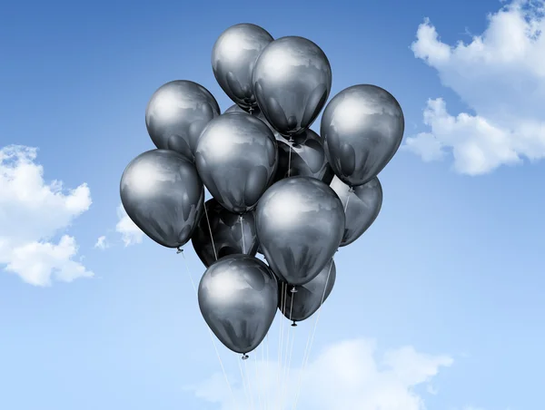 Silberne Luftballons am blauen Himmel — Stockfoto