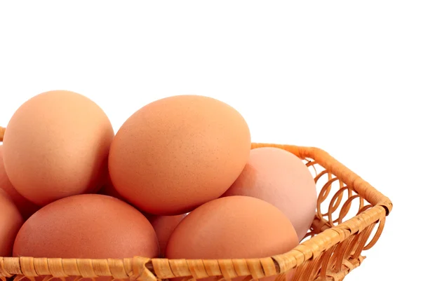Huevos en una cesta —  Fotos de Stock