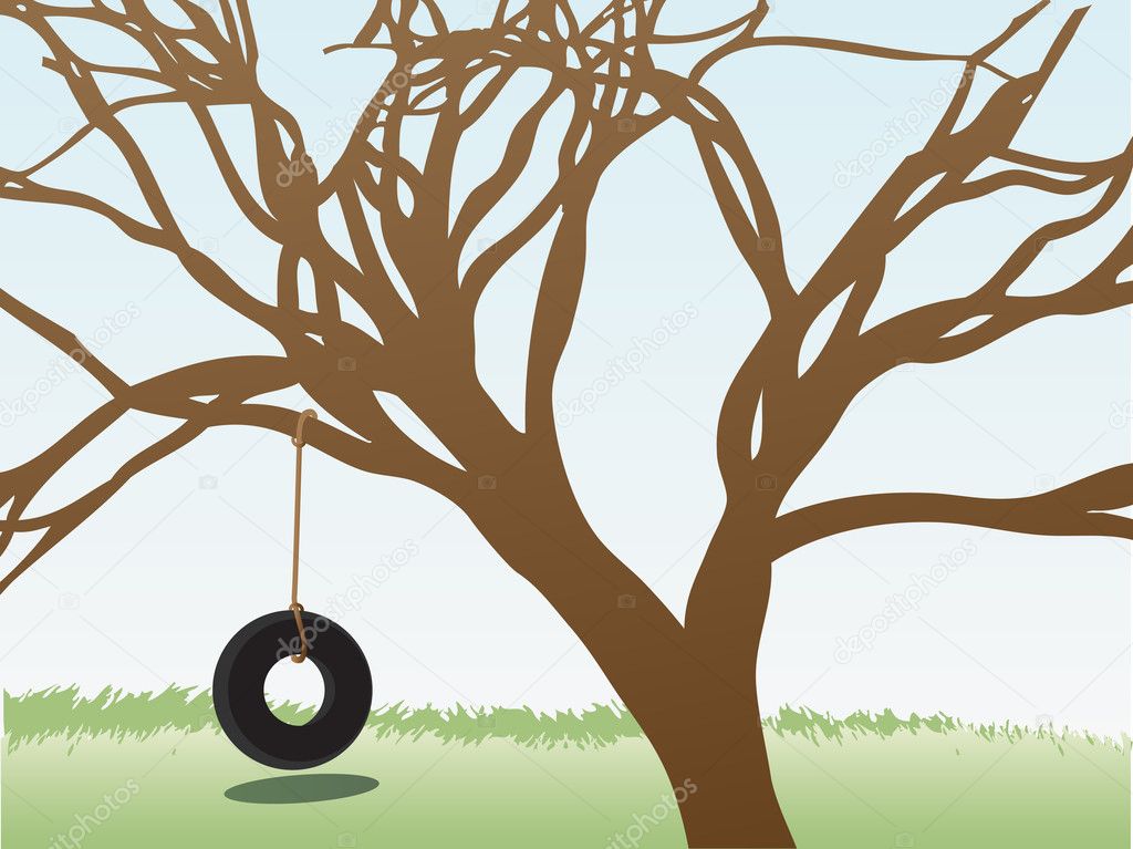 Tire swings hangs from leafless tree in grass field daytime