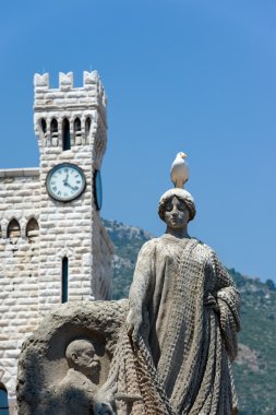 Statue of the Prince's Palace in Monaco under blue sky clipart