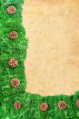 Christmas green framework with Pine needles and cones on paper clipart