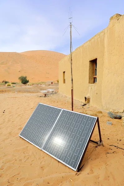 stock image Solar panel with desert house