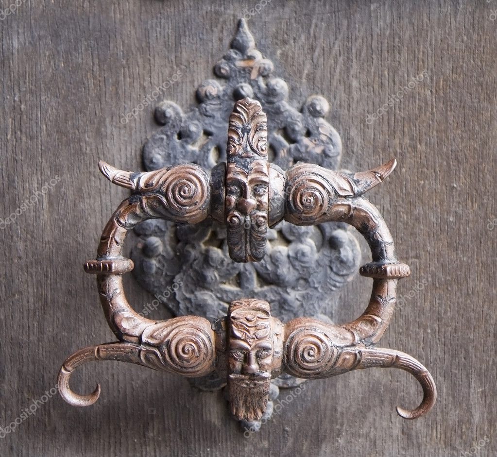 Medieval door knocker | Medieval door knocker — Stock Photo © Gbuglok ...