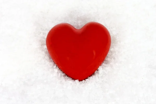 Herz im Schnee Stockfoto