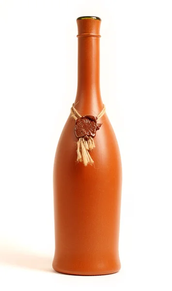 Ceramic vintage bottle with sealing wax press isolated on white