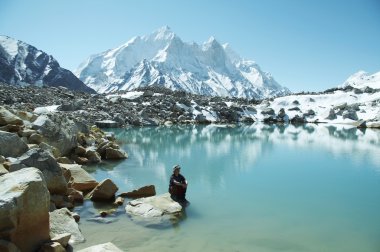 Girl on mountain lake clipart