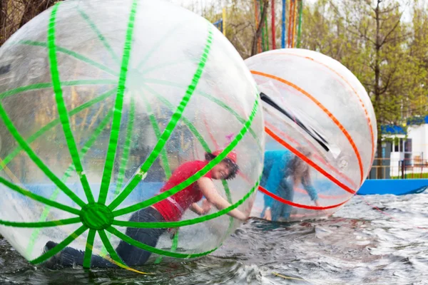 Girls playing in Zorb — Stock Photo, Image