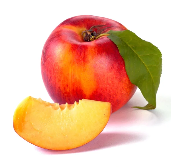 Smooth peaches and a half — Stock Photo, Image