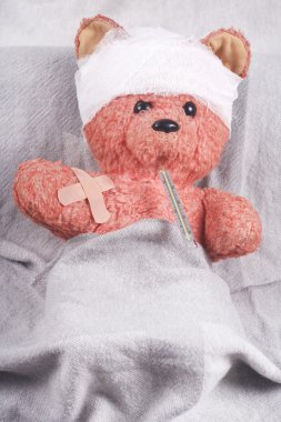 The small patient a bear on a white background clipart