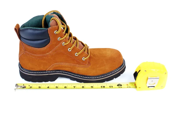Boot and tape-measure — Stock Photo, Image
