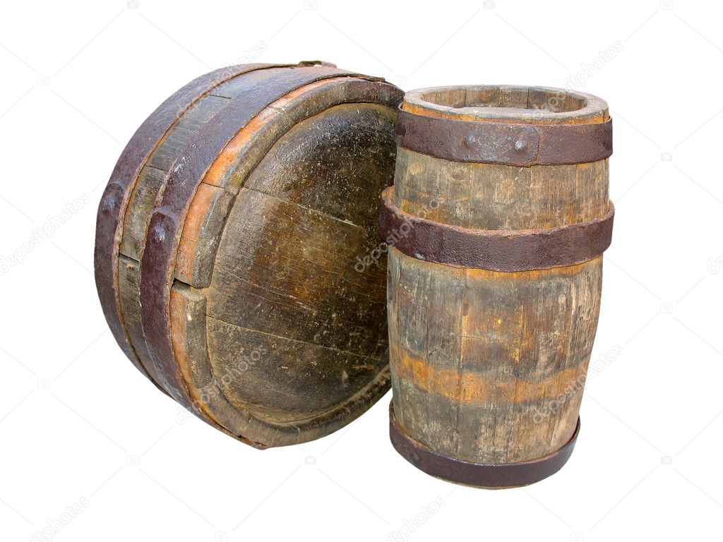 Ancient wooden barrels isolated on white