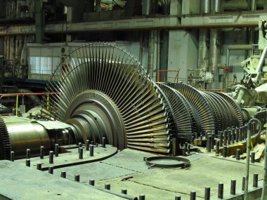 Power generator steam turbine during repair, machinery, pipes, tubes at a power plant, night scene clipart