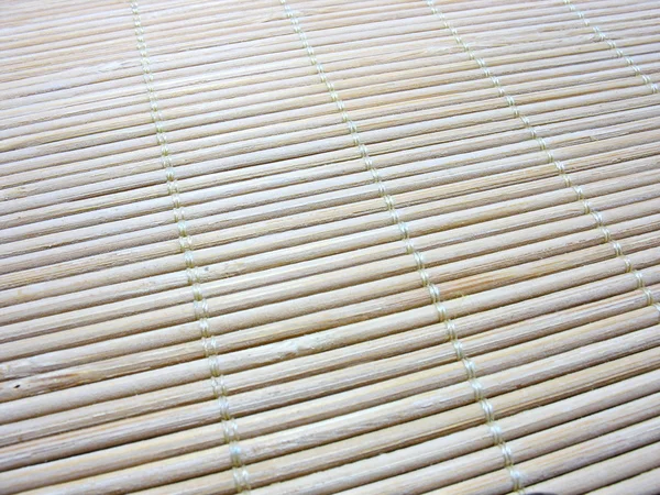 Macro di una nuova texture di tappetino di bambù — Foto Stock