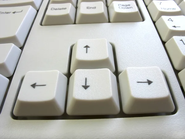Vier pijltoetsen op een toetsenbord van de computer — Stockfoto
