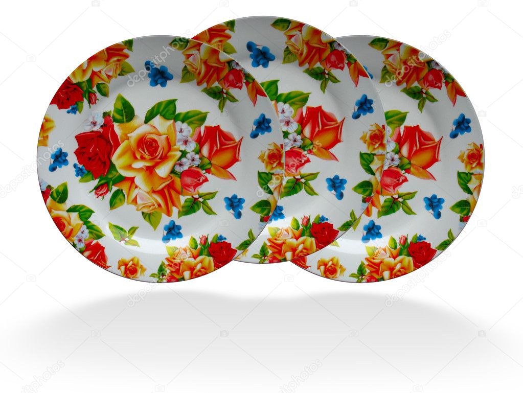 Brighr floral decorated dish plate on white background