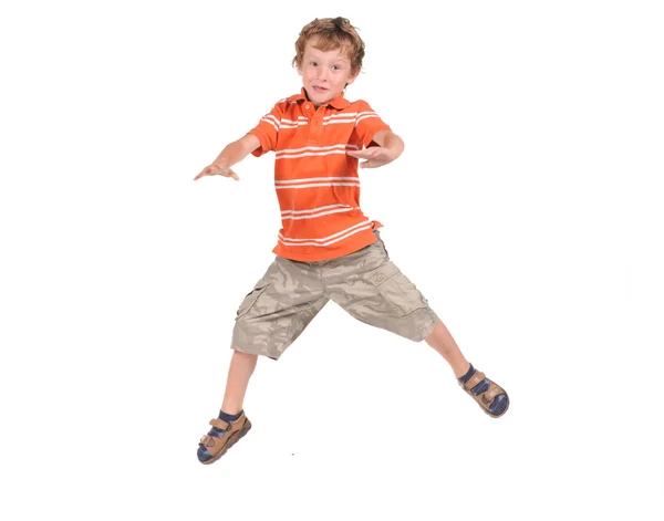 Springender Junge — Stockfoto