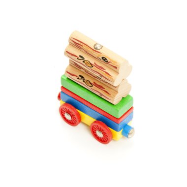 Conceptual image of a production situation of over capacity, represented by a toy train carriage, over loaded clipart