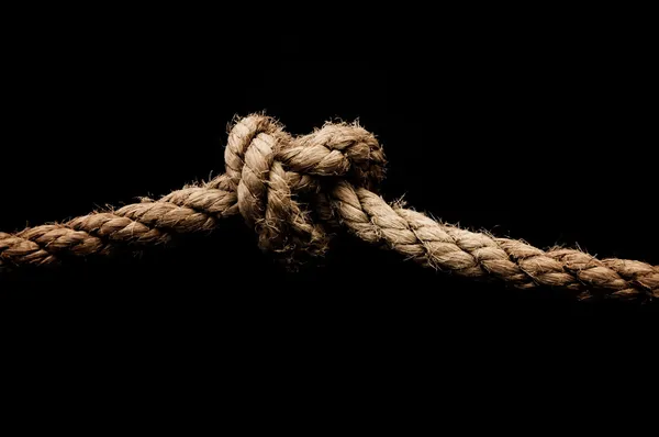 Rope knot on black background. Concept for unity 9050389 Stock Photo at  Vecteezy