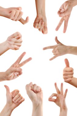 Various hand signs and symbols over a white background. clipart
