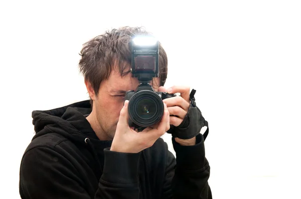 Fotógrafo Atirando Com Câmera Dslr Flash Isolado Branco — Fotografia de Stock