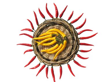 Red and yellow chili peppers on a wicker stand clipart