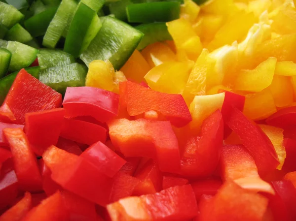 stock image Yellow, red and green peppers Bulgarian. Slicing. Cubes