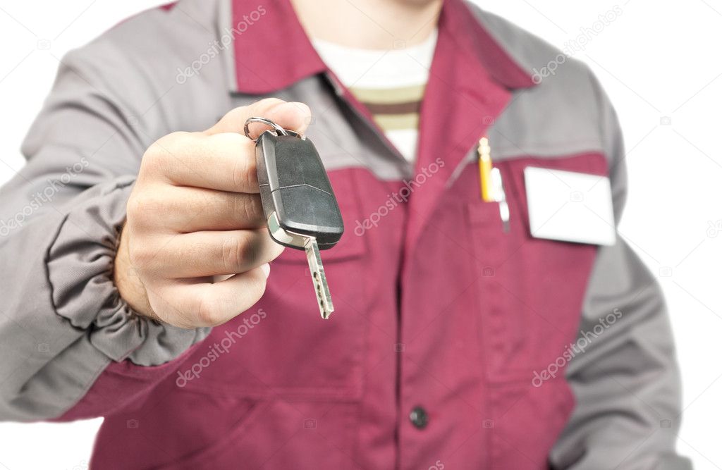 Mechanic giving a car key