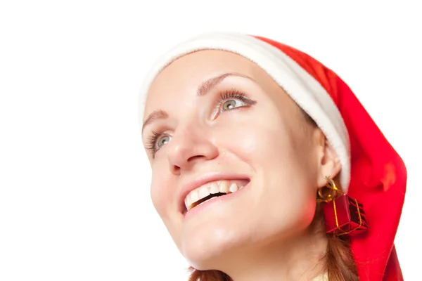 Happy smiling woman in christmas hat with gift earring — Stock Photo, Image