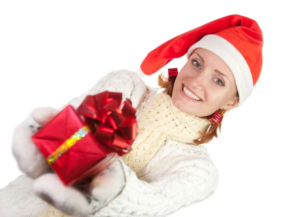 Happy woman in christmas hat with gift — Stock Photo, Image