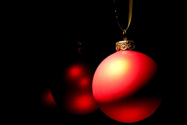 Hanging Christmas red baubles — Stock Photo, Image