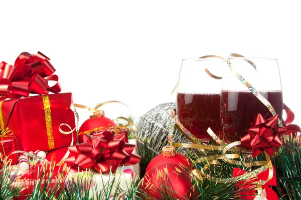 Holiday gifts and wine glasses Stock Image
