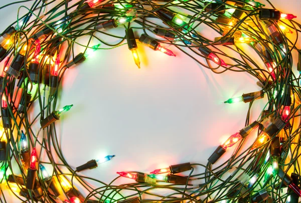 Πλαίσιο της πολύχρωμα φώτα των Χριστουγέννων — Φωτογραφία Αρχείου