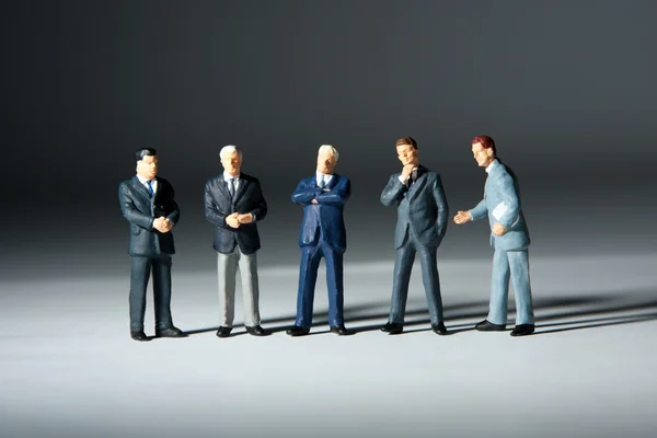Miniature figurines of successful business team — Stock Photo, Image
