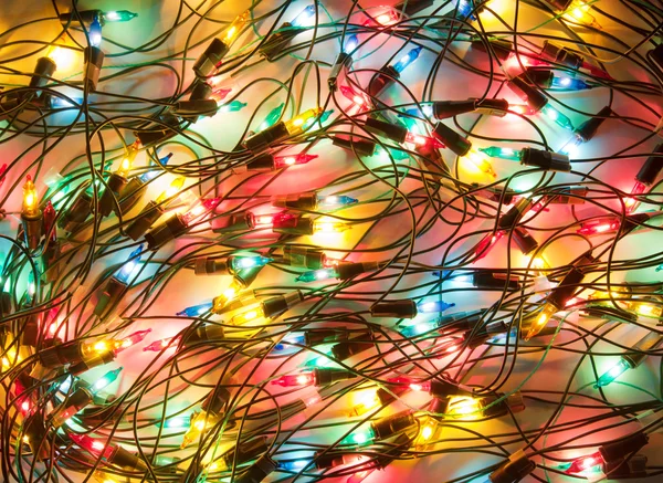 Hintergrund der bunten Weihnachtsbeleuchtung — Stockfoto