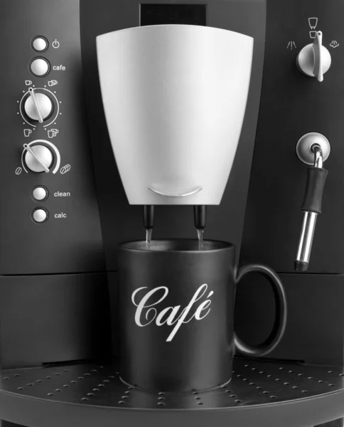 Machine à café avec tasse noire — Photo