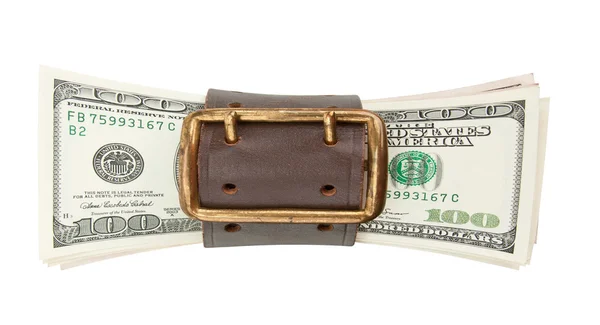 Apriete el cinturón y la pila de dólares —  Fotos de Stock