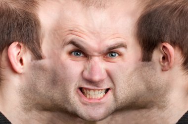 A panoramic face of very angry man clipart
