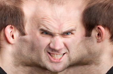 Panoramic face of malicious man clipart