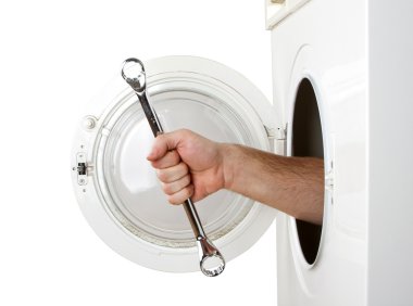 Repairman servicing washing machine clipart