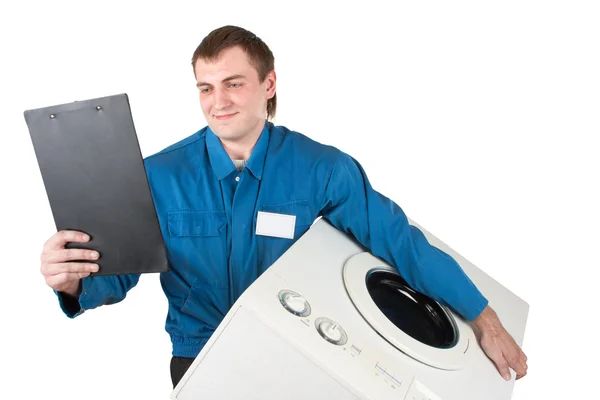 Repairman servicing washing machine — Stock Photo, Image